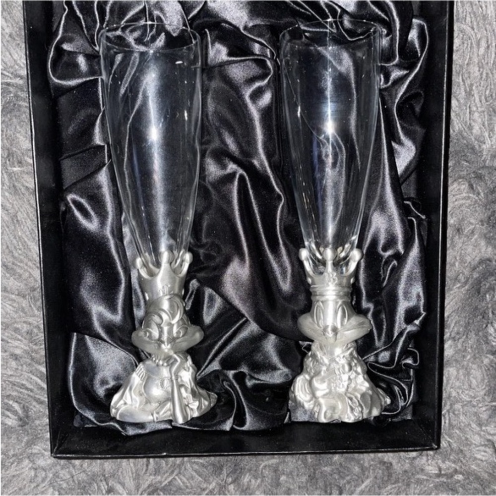 Antique Warner bros wine flutes .
